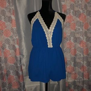 Halter neck romper with lace trimming